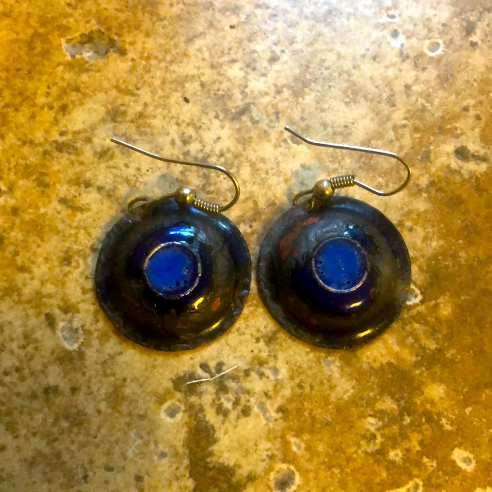 Metal earrings with blue center